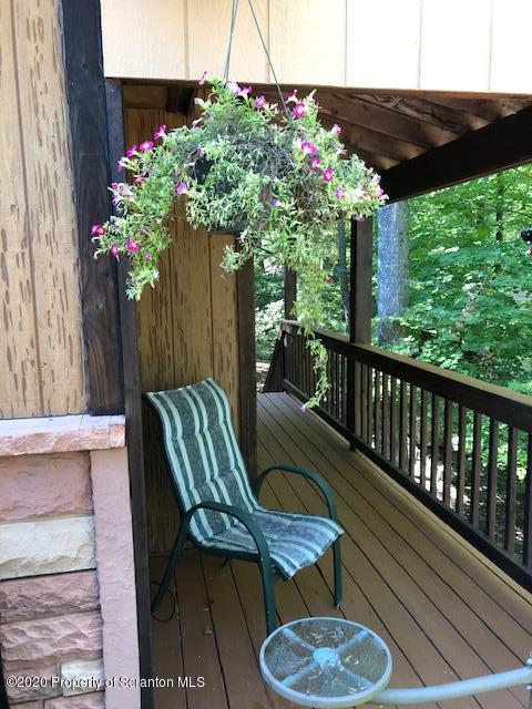 199 Eskra Road Lake Ariel, PA 18436 - Photo 24 of 36 a view of a chairs and table in the balcony