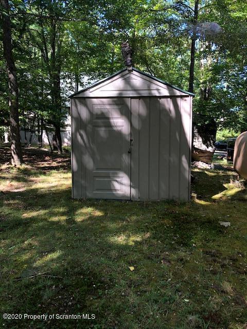 199 Eskra Road Lake Ariel, PA 18436 - Photo 26 of 36 a tent sitting in middle of the forest