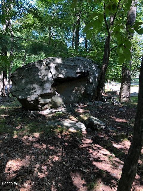 199 Eskra Road Lake Ariel, PA 18436 - Photo 27 of 36 a view of a lake with lots of trees
