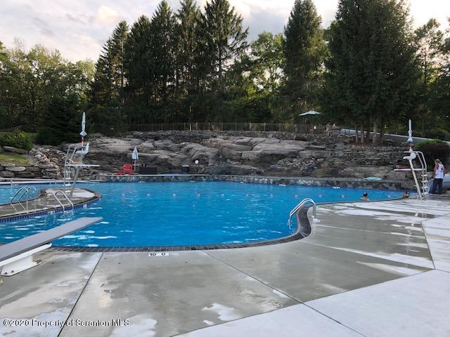 199 Eskra Road Lake Ariel, PA 18436 - Photo 36 of 36 a view of a yard with fire pit