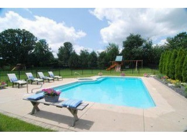 3703 Chesapeake Road St. Charles, IL 60175 - Photo 3 of 17 a view of swimming pool with lounge chair