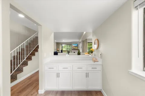 a en suite bathroom with a sink and a mirror
