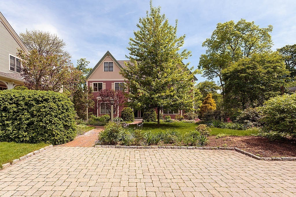 53 B Burroughs Street Boston, MA 02130 - Photo 1 of 41 a front view of a house with a yard