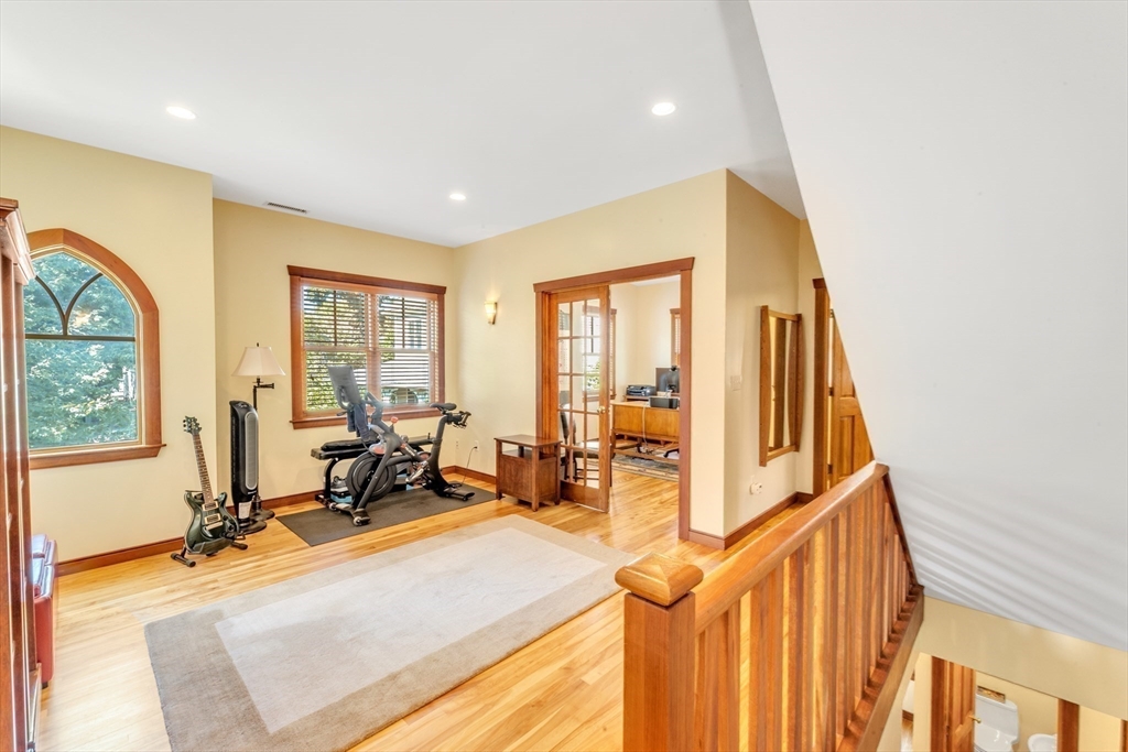 53 B Burroughs Street Boston, MA 02130 - Photo 13 of 41 a view of a room with gym equipment