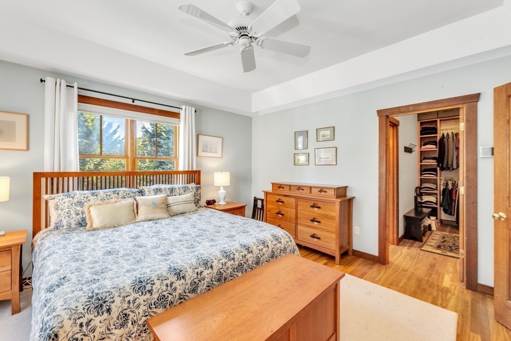 53 B Burroughs Street Boston, MA 02130 - Photo 17 of 41 a bedroom with a bed and a dresser