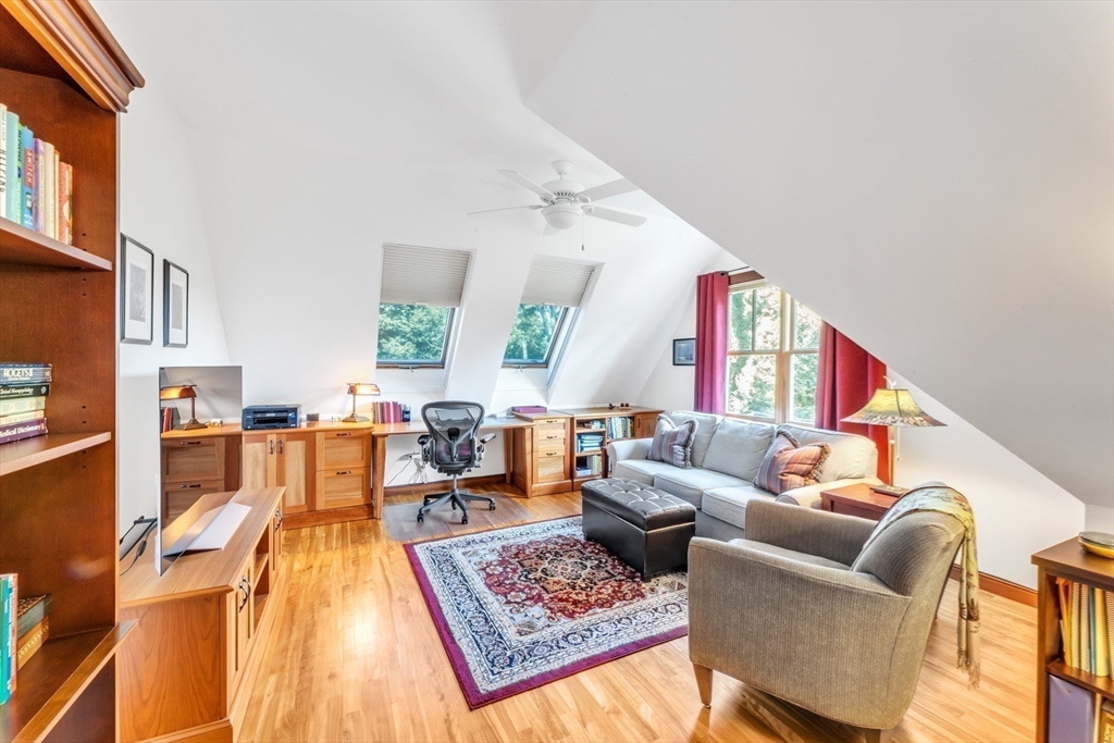 53 B Burroughs Street Boston, MA 02130 - Photo 25 of 41 a living room with furniture and a rug