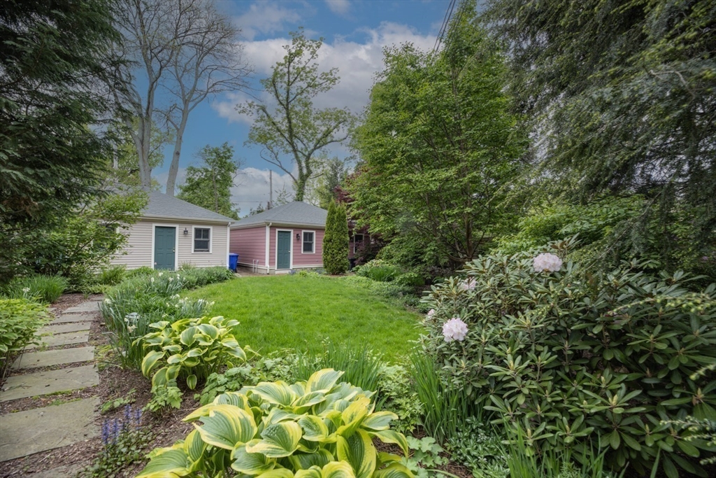 53 B Burroughs Street Boston, MA 02130 - Photo 29 of 41 a view of a house with a yard and garden