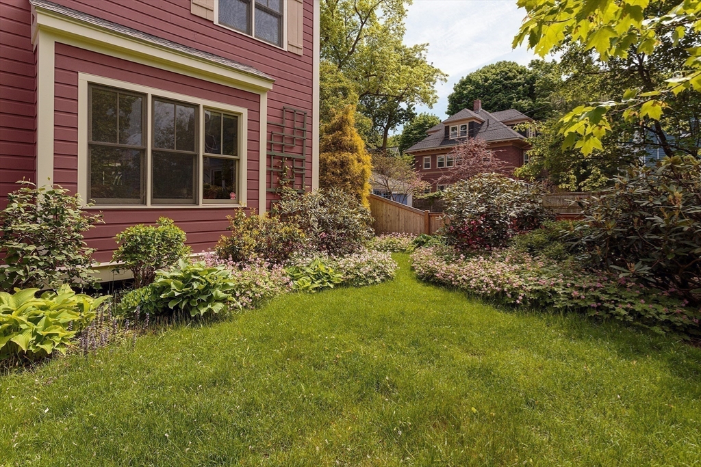 53 B Burroughs Street Boston, MA 02130 - Photo 31 of 41 a view of a house with a garden