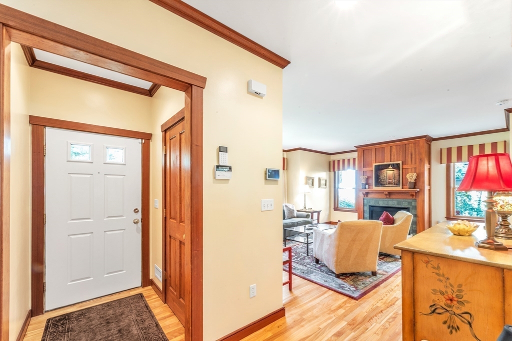 53 B Burroughs Street Boston, MA 02130 - Photo 6 of 41 a view of living room with furniture and a flat screen tv
