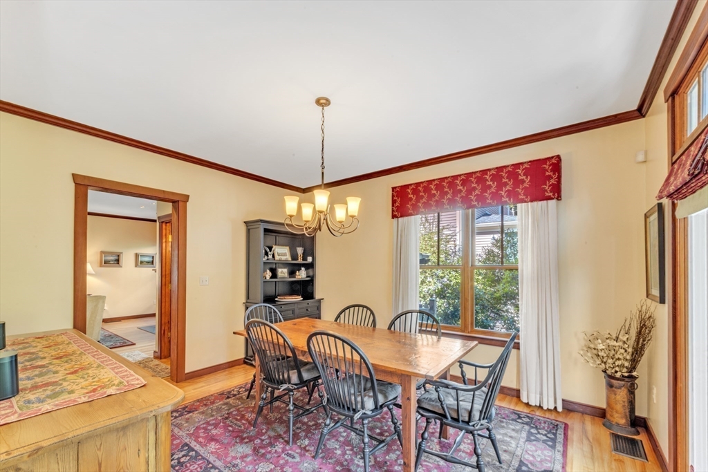 53 B Burroughs Street Boston, MA 02130 - Photo 8 of 41 a view of a dining room with furniture window and outside view