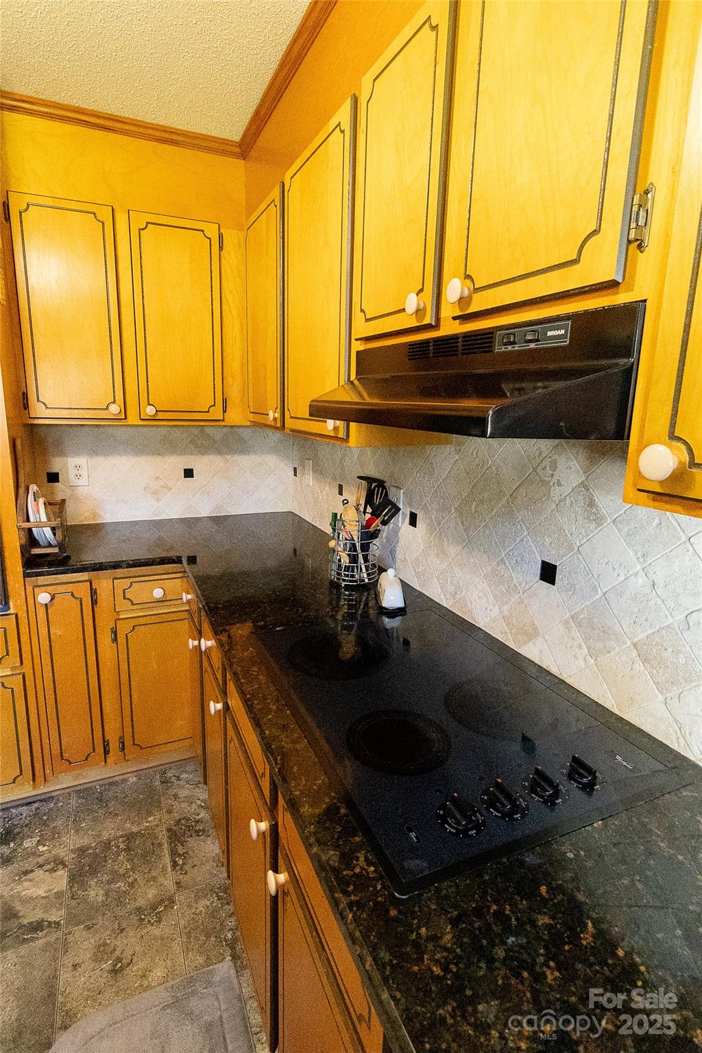 535 Holly Ridge Road Grover, NC 28073 - Photo 13 of 40 a kitchen with sink a window and cabinets