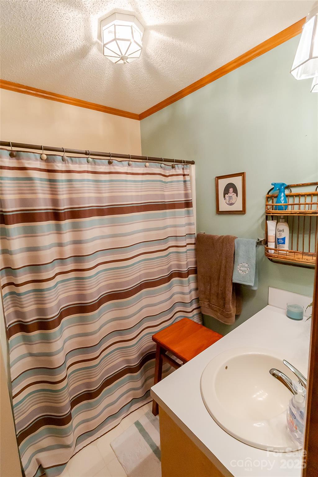 535 Holly Ridge Road Grover, NC 28073 - Photo 18 of 40 a bathroom with a sink and a mirror