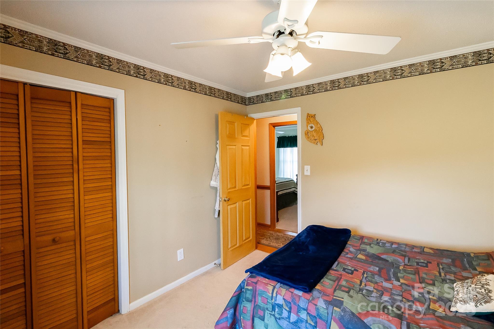 535 Holly Ridge Road Grover, NC 28073 - Photo 20 of 40 a bedroom with a bed and a dresser
