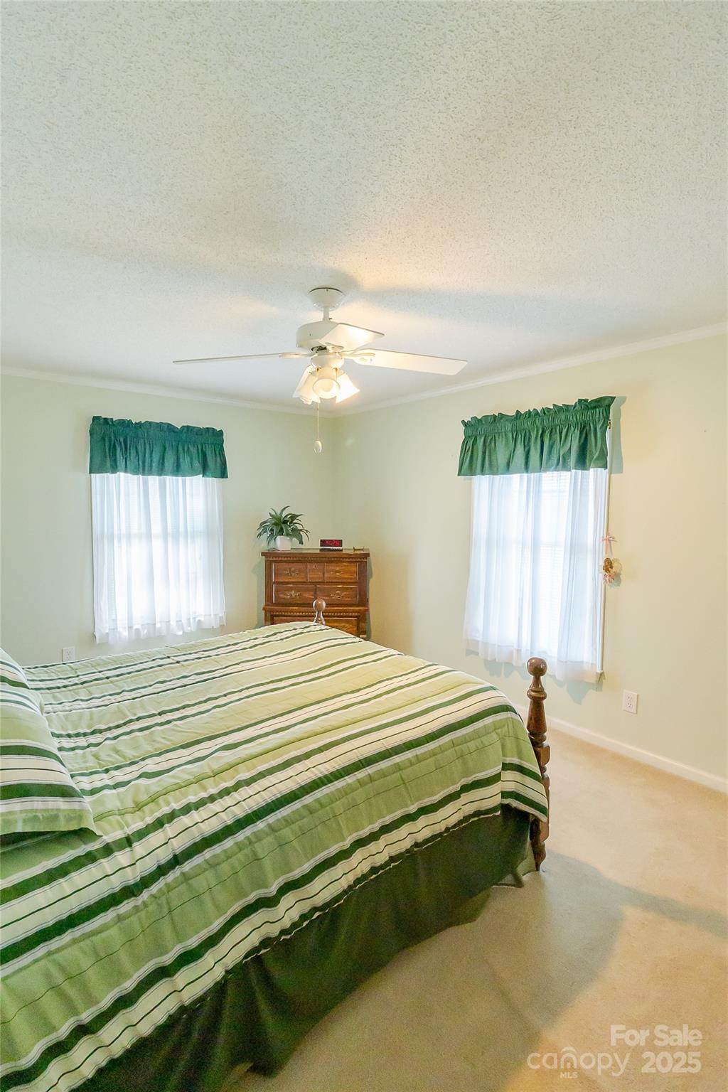 535 Holly Ridge Road Grover, NC 28073 - Photo 22 of 40 a bedroom with a bed and window