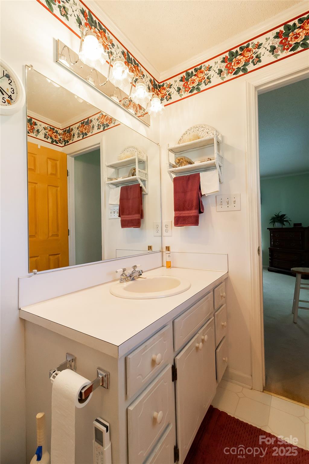 535 Holly Ridge Road Grover, NC 28073 - Photo 26 of 40 a bathroom with a sink and mirror