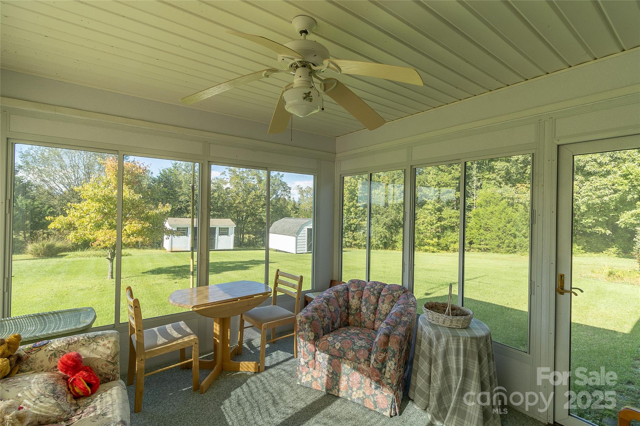 535 Holly Ridge Road Grover, NC 28073 - Photo 29 of 40 a living room with furniture and floor to ceiling windows