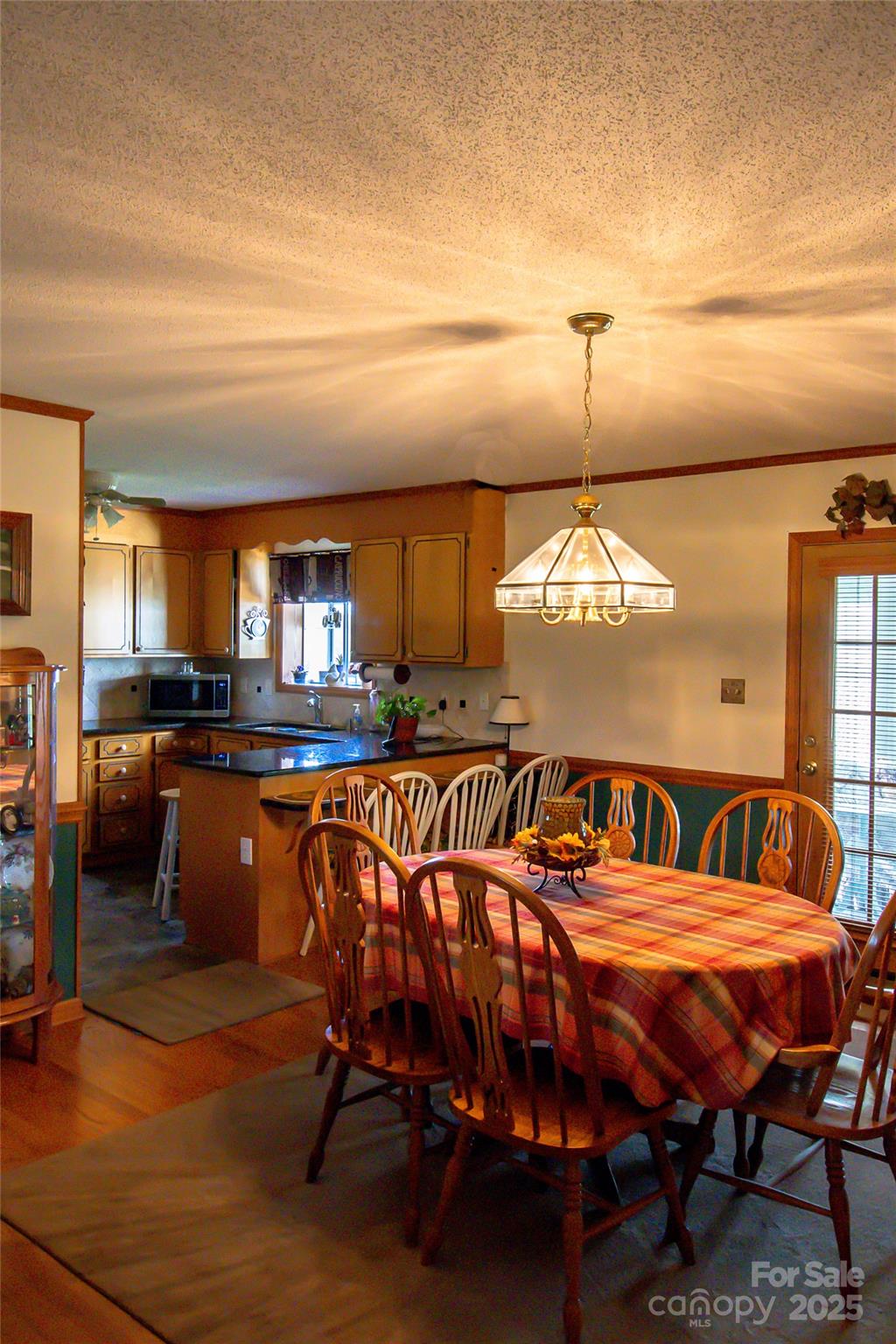 535 Holly Ridge Road Grover, NC 28073 - Photo 9 of 40 a balcony with chairs and table