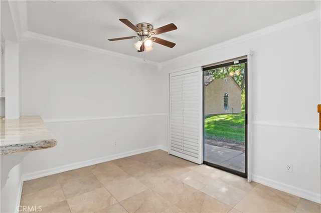 a kitchen with a sink and a refrigerator