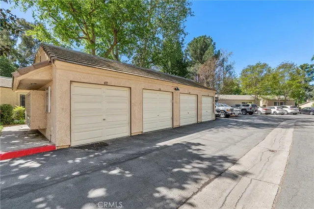a view of a back yard of the house