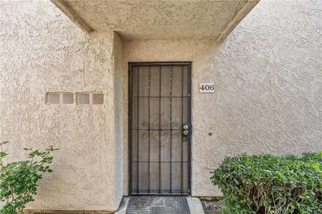 a view of a bathroom from a hallway