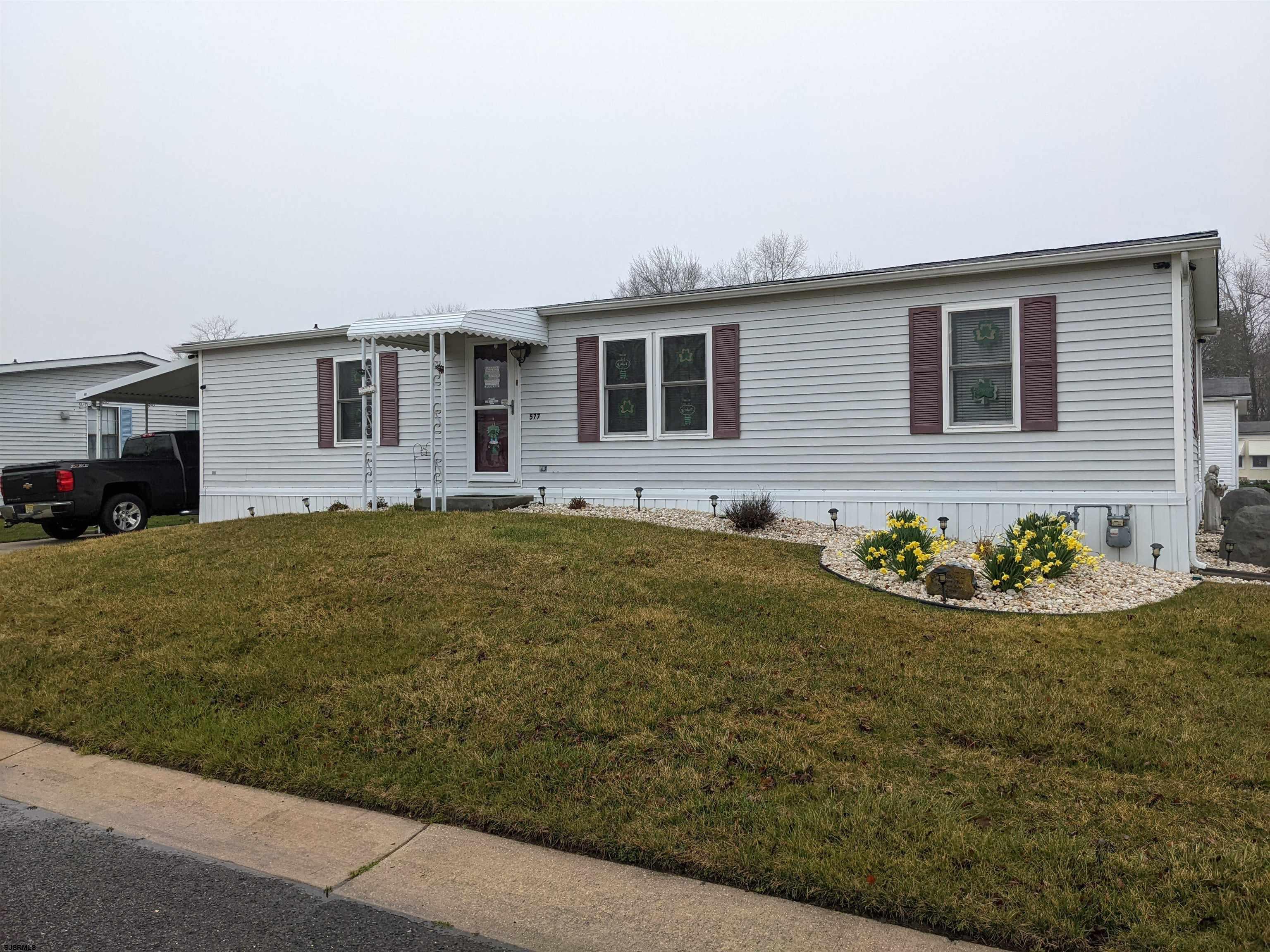 a front view of house with yard
