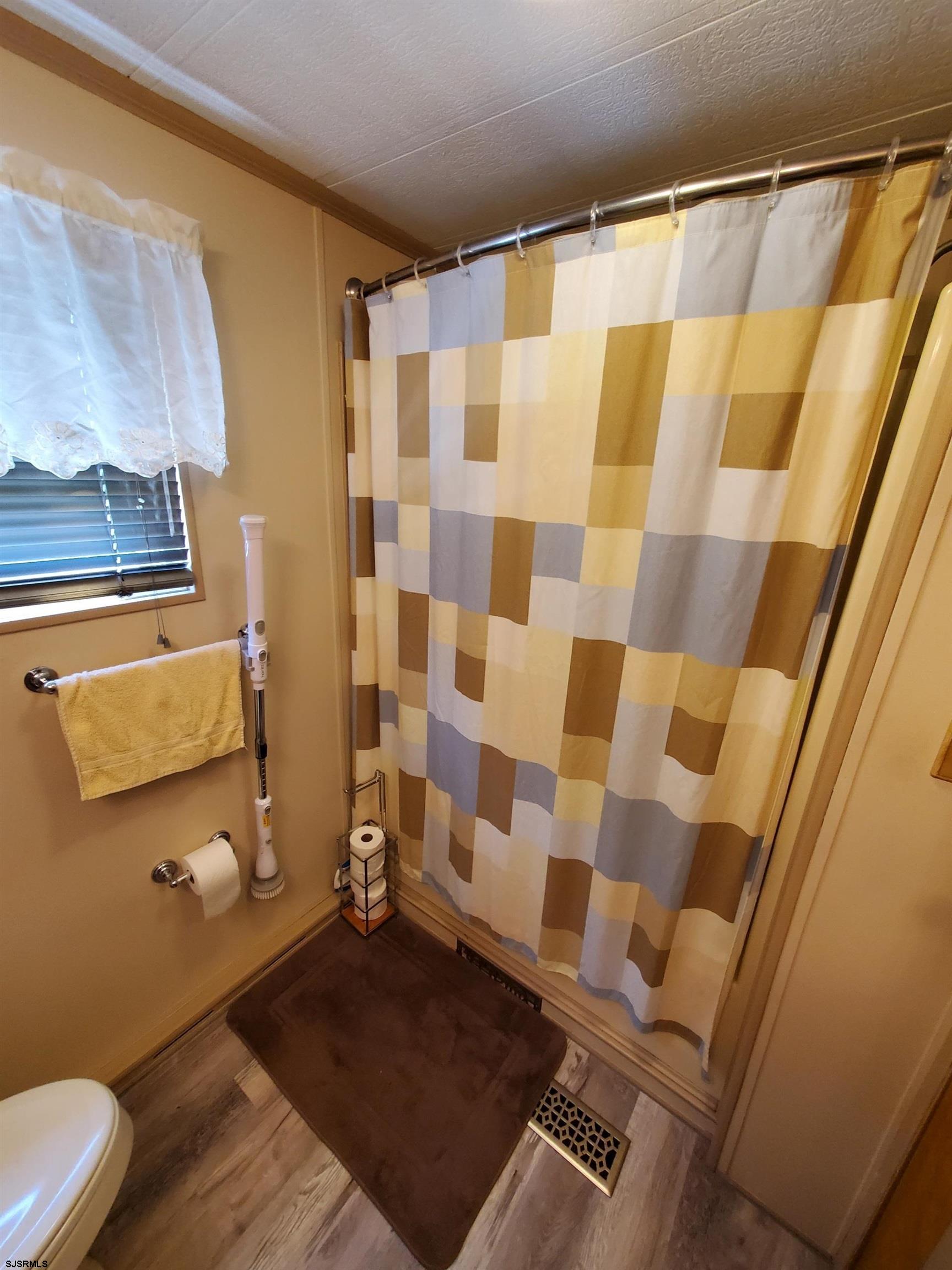 577 Miles Standish Lane Buena, NJ 08310 - Photo 14 of 25 a bathroom with a sink toilet and shower