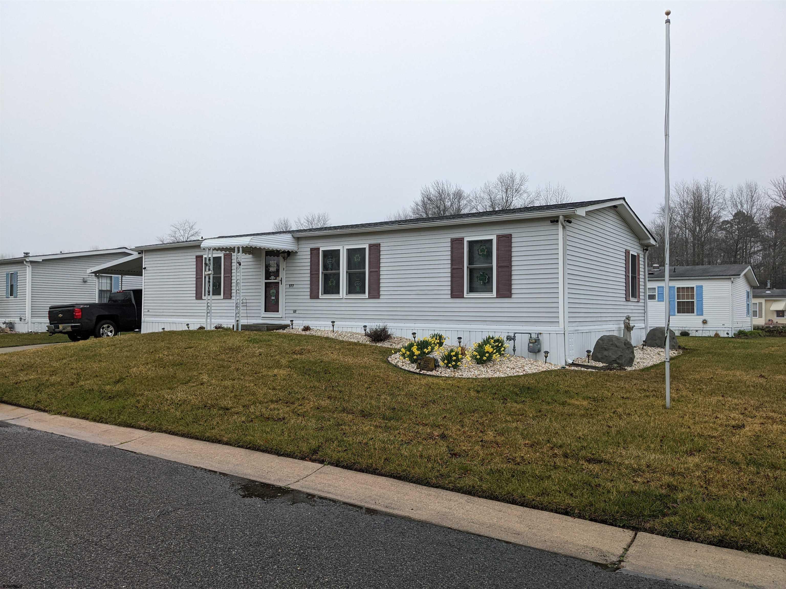 577 Miles Standish Lane Buena, NJ 08310 - Photo 2 of 25 a view of a house with a patio