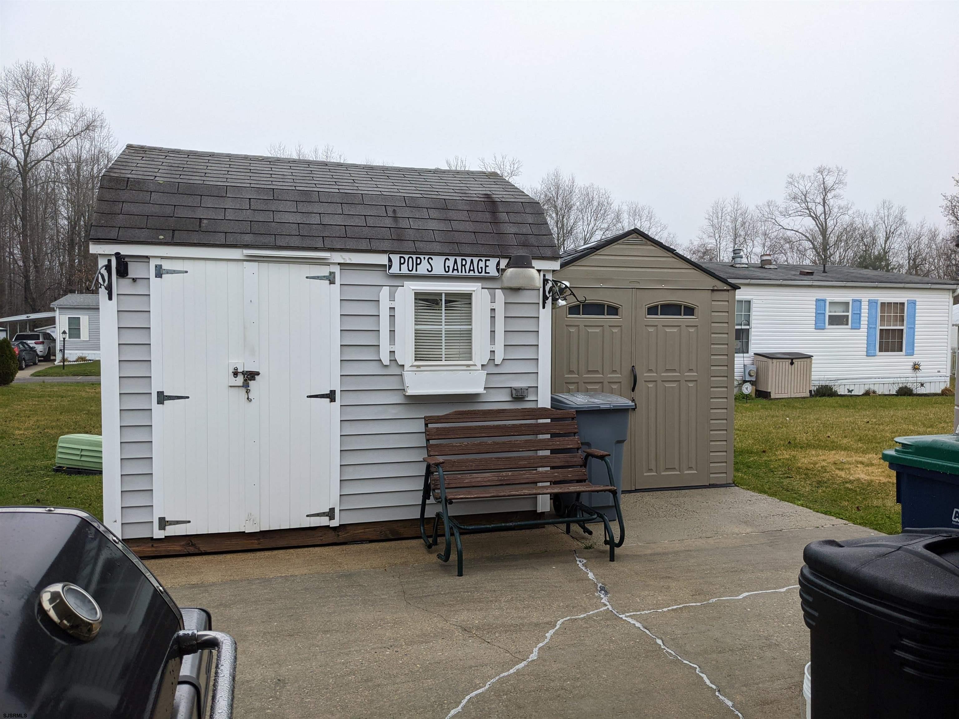 577 Miles Standish Lane Buena, NJ 08310 - Photo 25 of 25 a view of backyard with seating space and barbeque oven