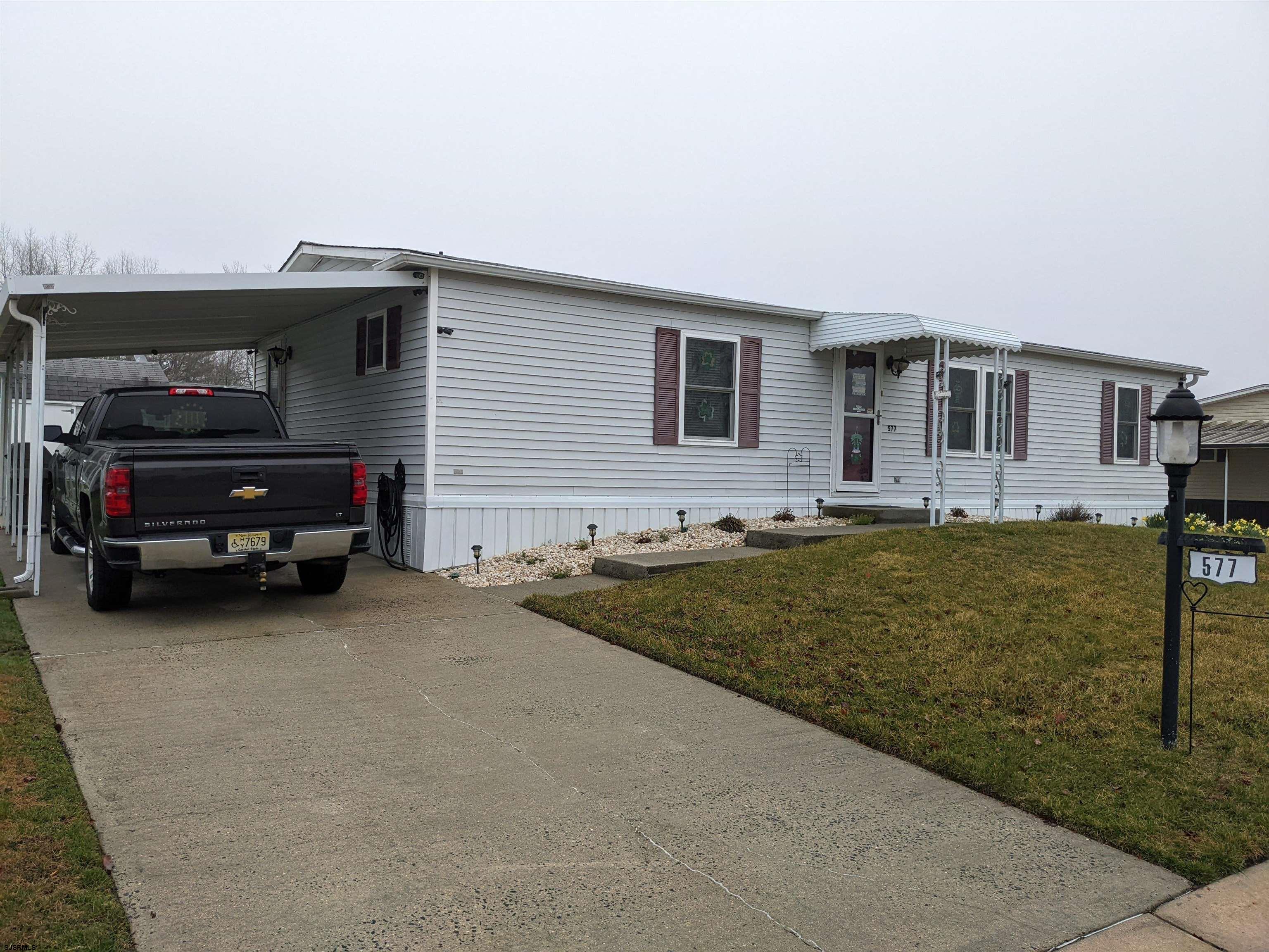 577 Miles Standish Lane Buena, NJ 08310 - Photo 3 of 25 a house view with a backyard space