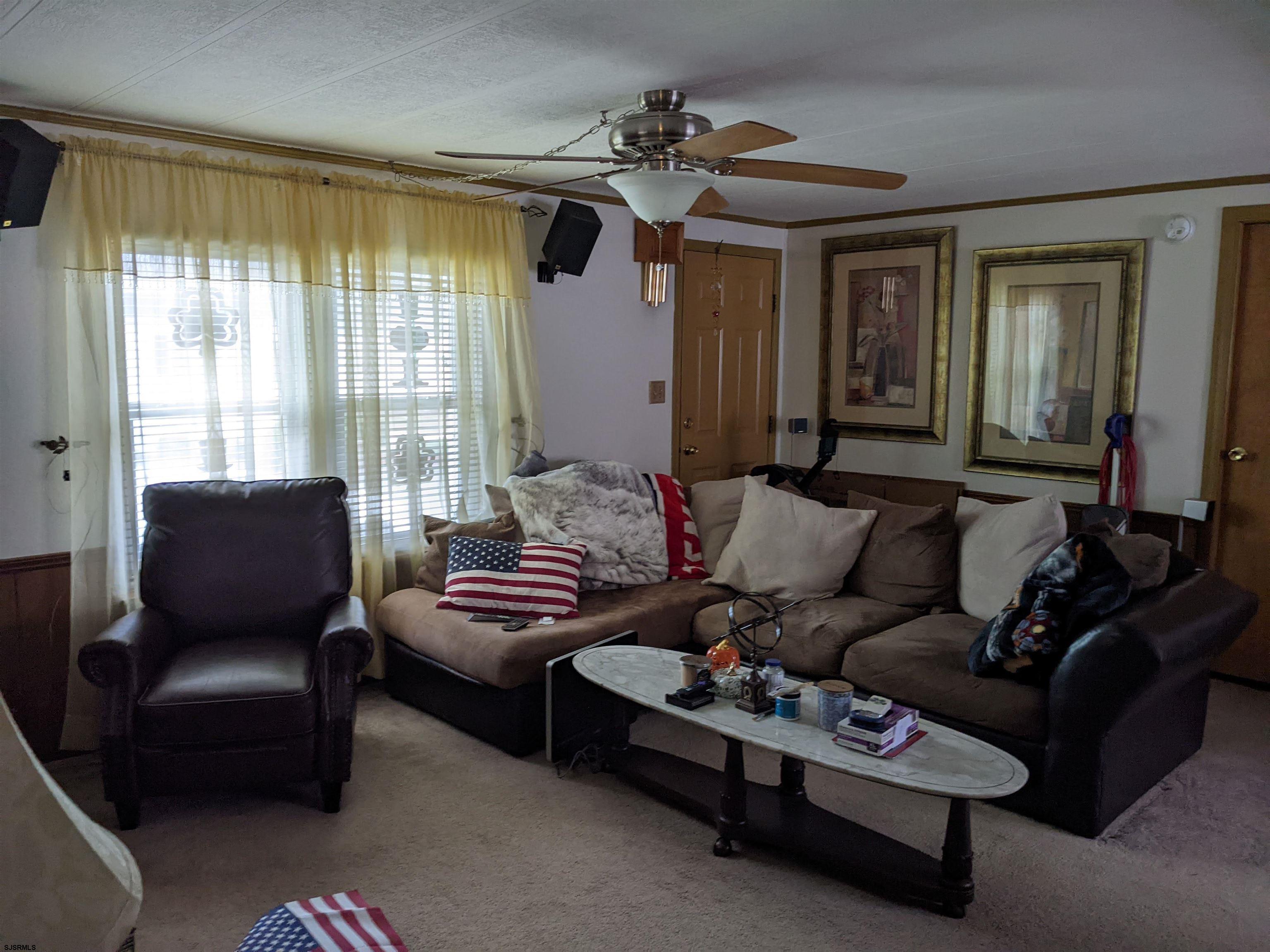 577 Miles Standish Lane Buena, NJ 08310 - Photo 10 of 25 a living room with furniture and a window