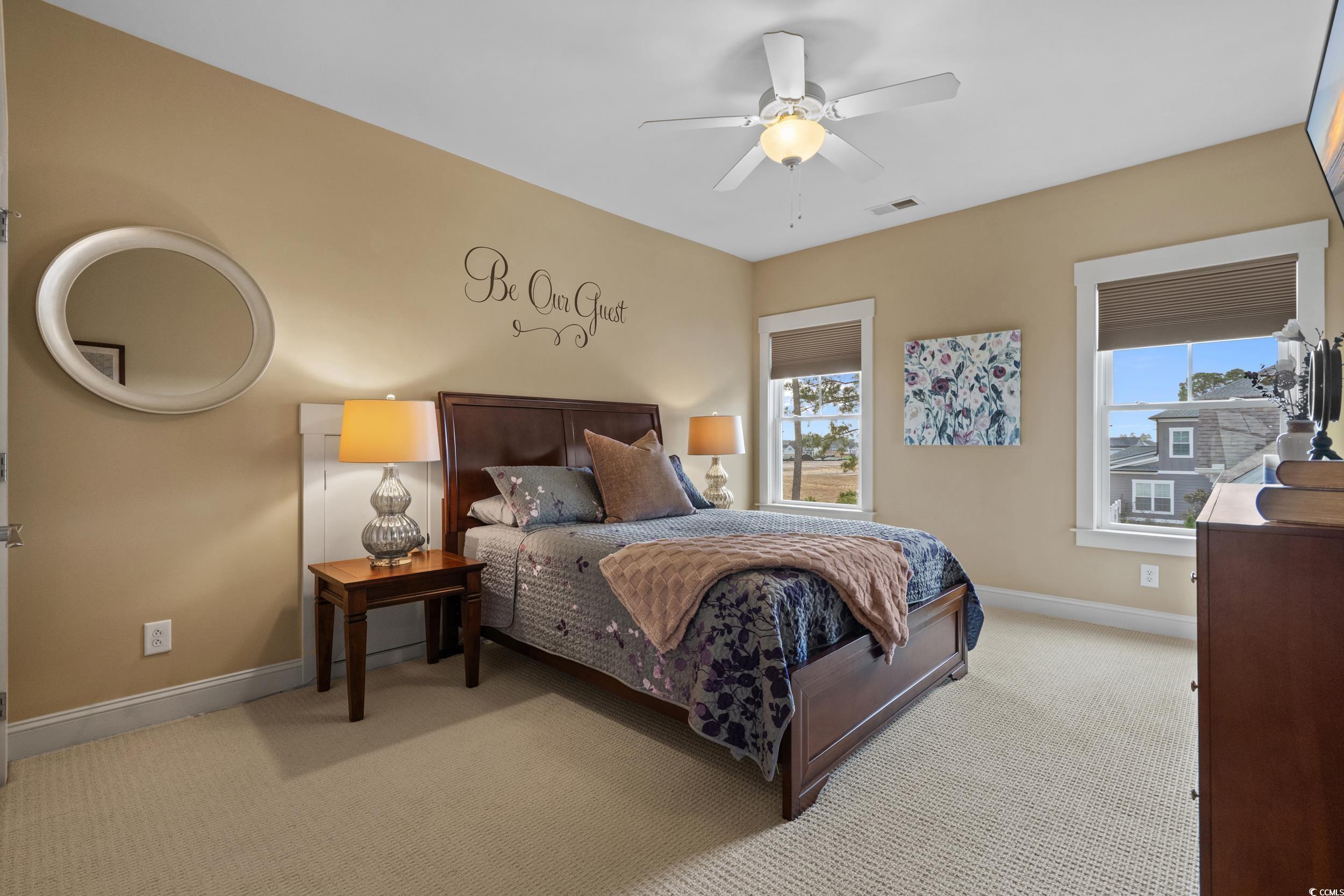 2604 Painted Trillium Court Myrtle Beach, SC 29579 - Photo 26 of 40 Bedroom featuring carpet and a ceiling fan