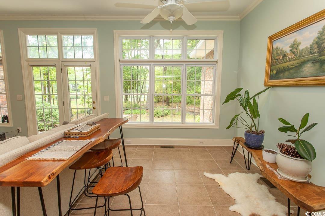 4535 Carriage Run Circle Murrells Inlet, SC 29576 - Photo 12 of 40 Sunroom with visible vents, a wealth of natural li