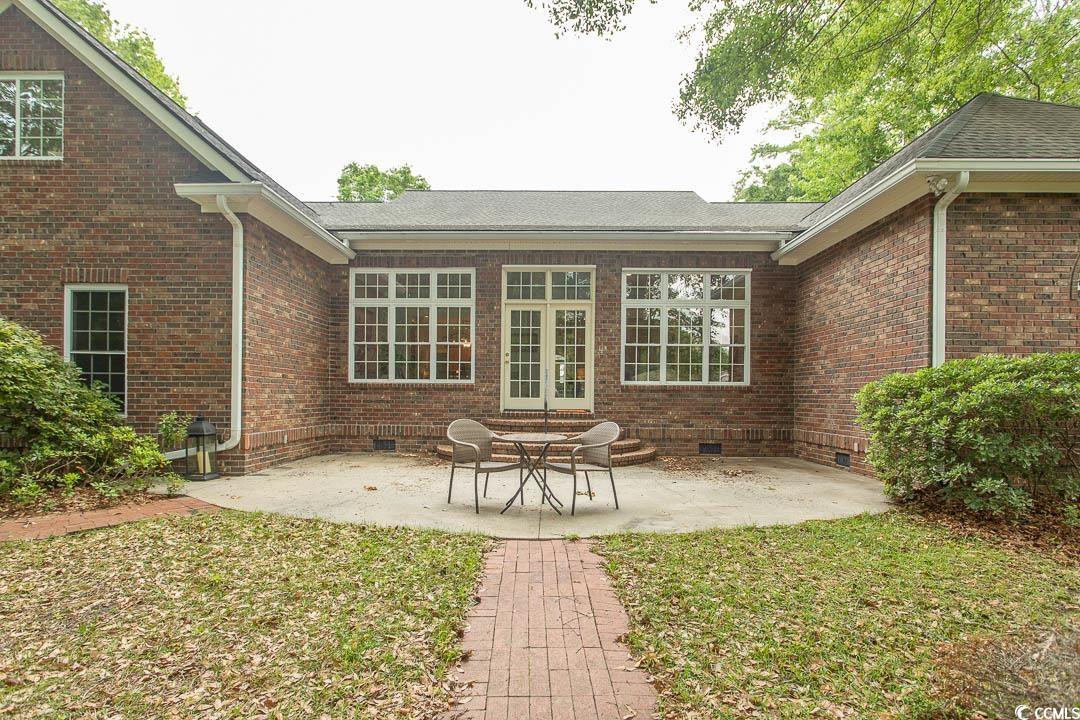 4535 Carriage Run Circle Murrells Inlet, SC 29576 - Photo 34 of 40 Back of property featuring a patio, crawl space, a