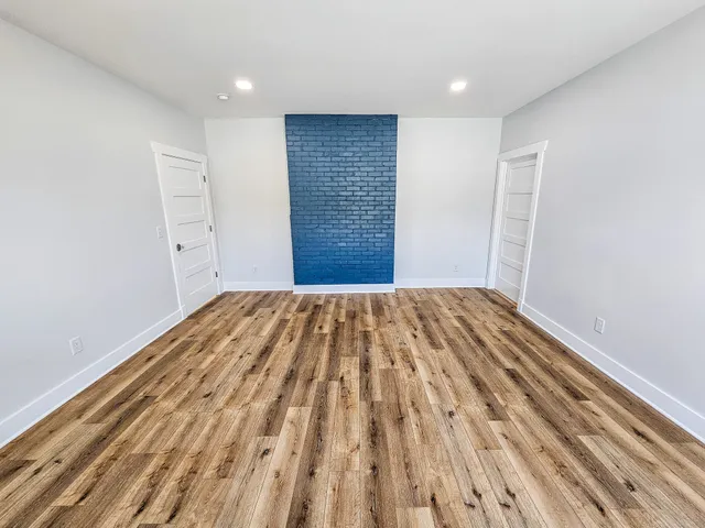 a bathroom with a bathtub and a sink