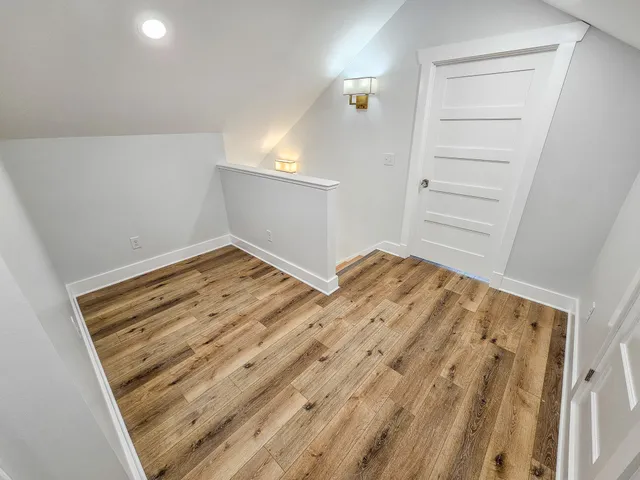 a bathroom with a sink a toilet and bathtub