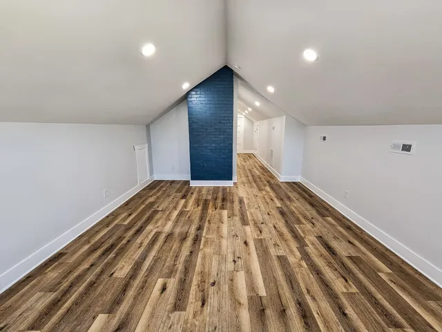a view of a big room with wooden floor