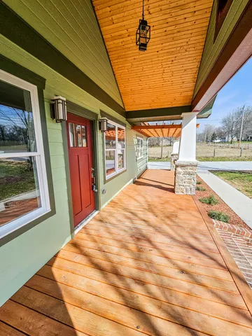 a bedroom with a bed and a walk in closet