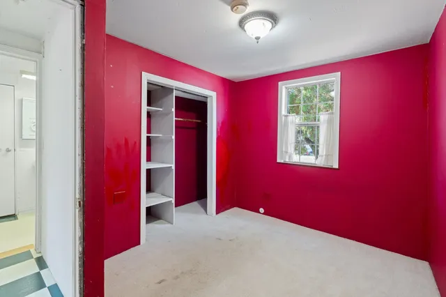 a view of a hallway with workspace