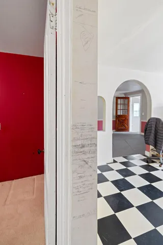 a kitchen with a refrigerator and a stove