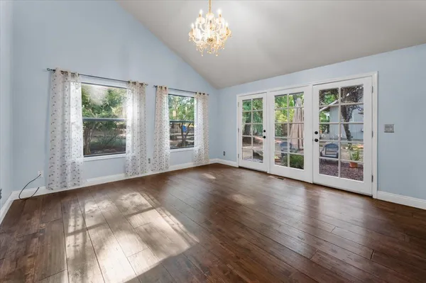 a view of entryway with wooden floor and stairs