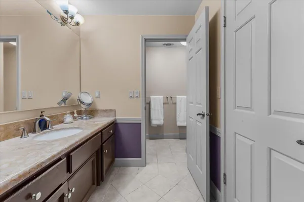 a bathroom with a toilet and a sink