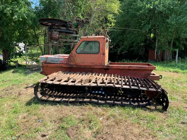 a kitchen with granite countertop white cabinets and stainless steel appliances