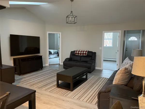 a view of yard with swimming pool and green space