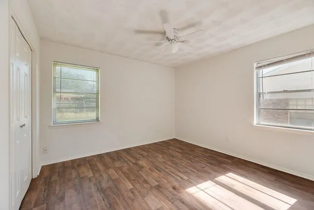 a view of a room that has a window in it