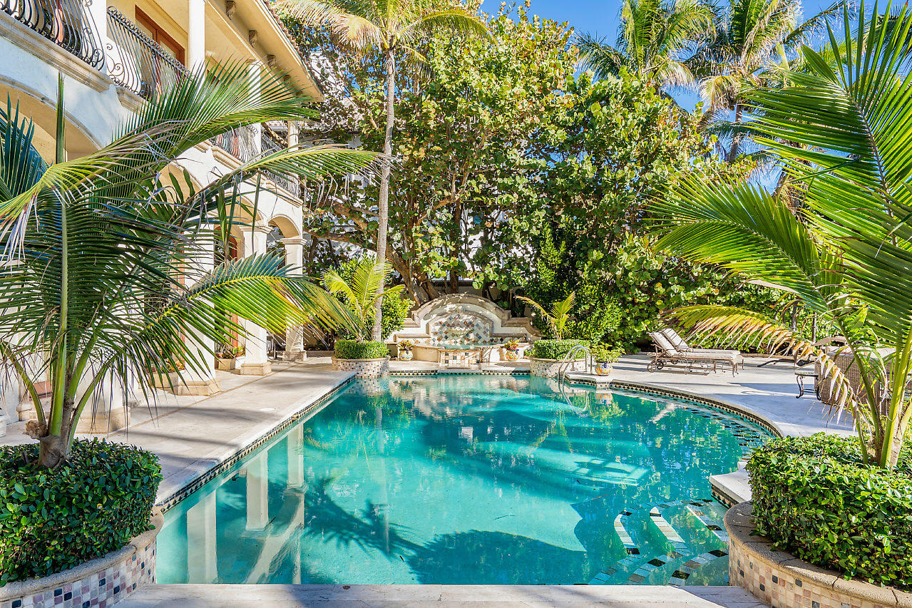 719 North Ocean Boulevard Delray Beach, FL 33483 - Photo 17 of 56 a view of yard with palm trees