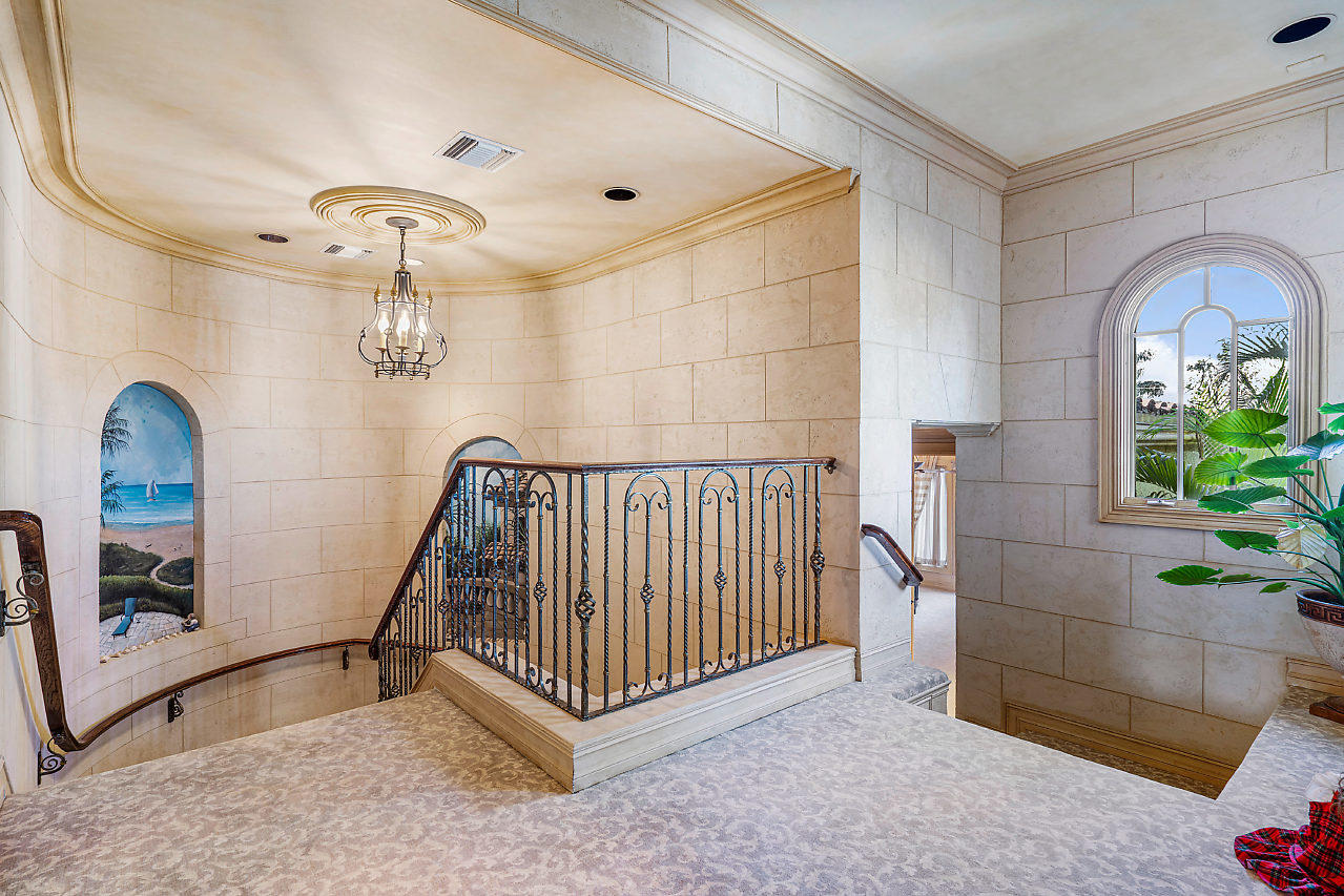 719 North Ocean Boulevard Delray Beach, FL 33483 - Photo 28 of 56 a view of entryway with a potted plant