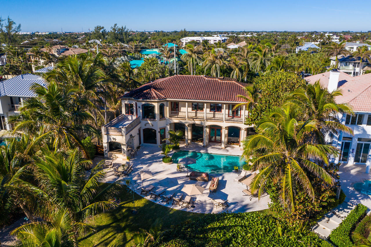 719 North Ocean Boulevard Delray Beach, FL 33483 - Photo 53 of 56 an aerial view of a house with a yard and lake view
