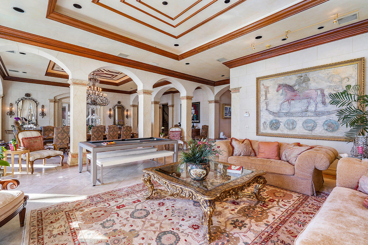 719 North Ocean Boulevard Delray Beach, FL 33483 - Photo 8 of 56 a living room with furniture and a rug