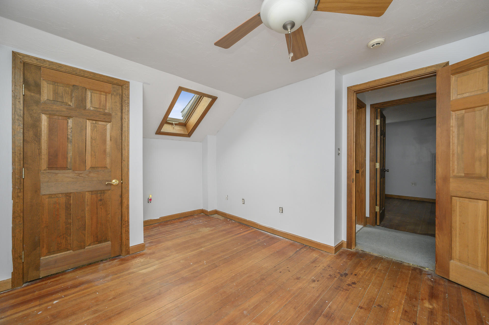 8 Indian Neck Road Wareham, MA 02571 - Photo 11 of 18 wooden floor in an empty room with a window