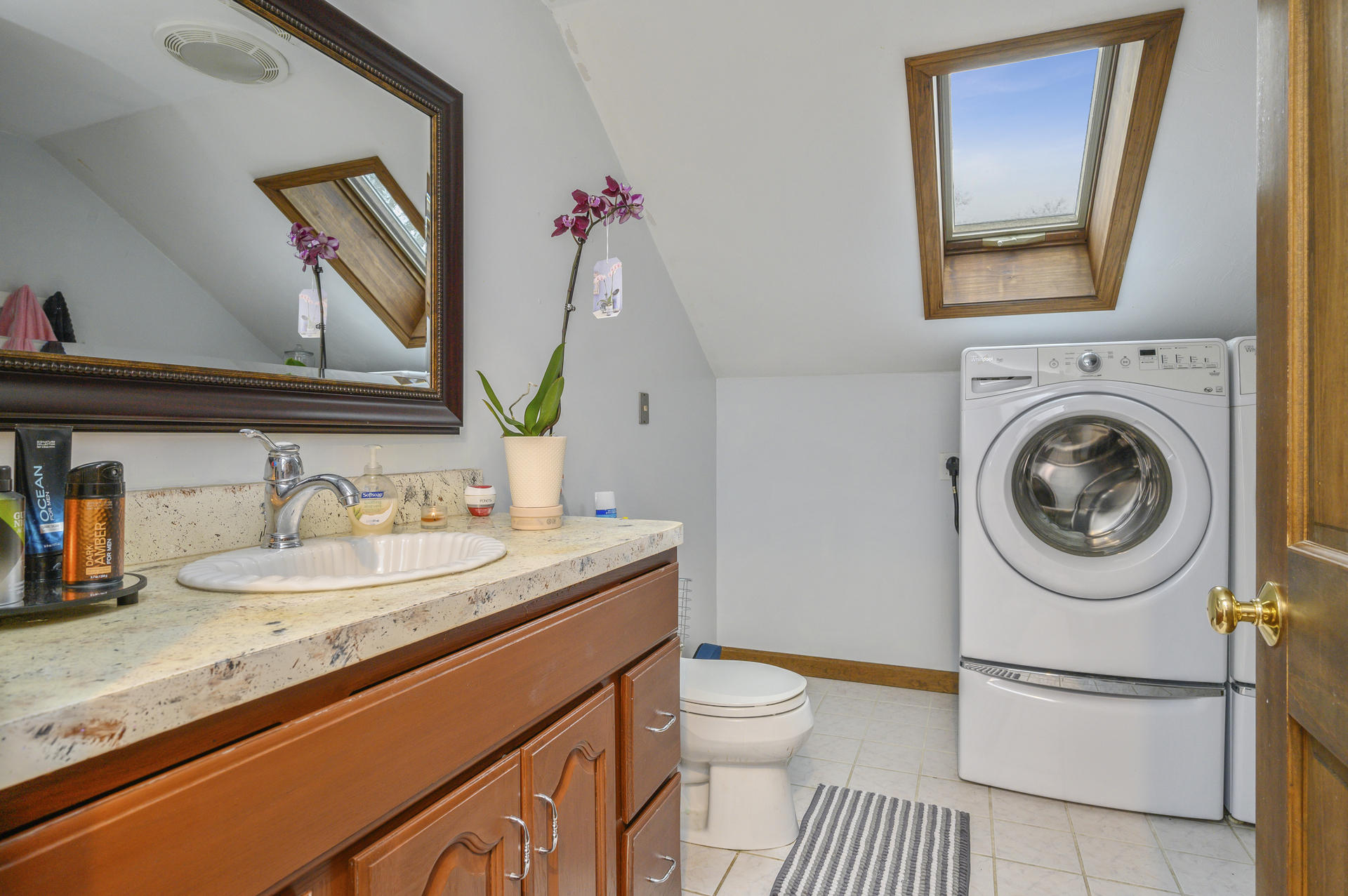 8 Indian Neck Road Wareham, MA 02571 - Photo 13 of 18 a bathroom with a sink a mirror and a toilet